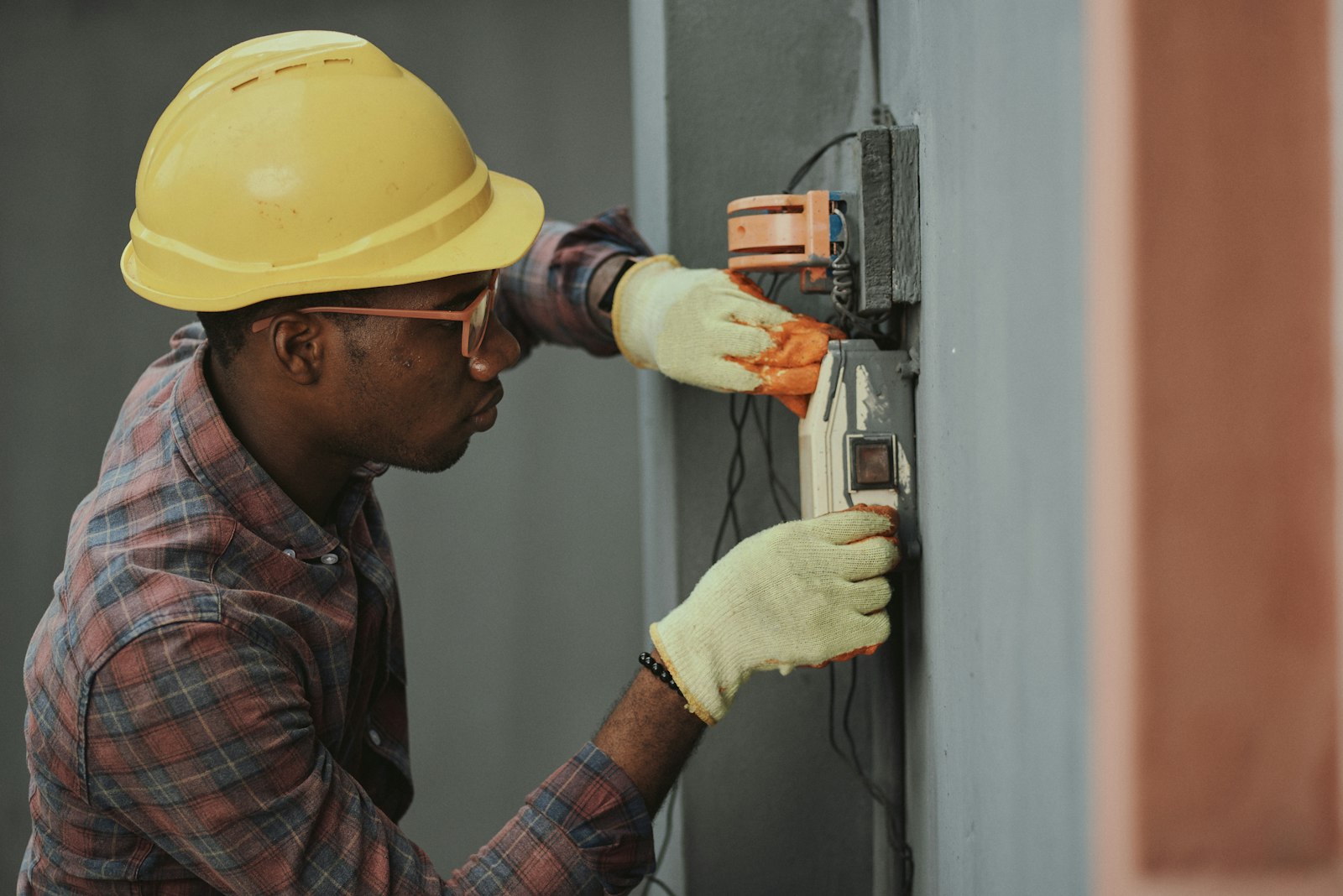 Licensed electrician working on a residential switchboard